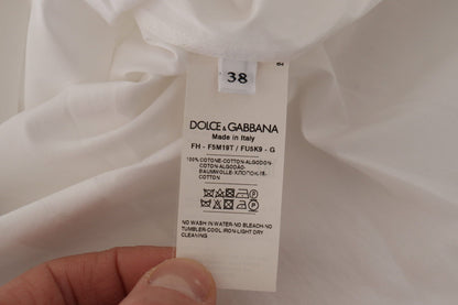 Dolce & Gabbana Elegant Sleeveless Tuxedo Blouse with Crystal Buttons